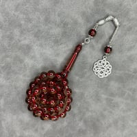 سبحه بكلايت احمر مكحل شفاف مع كركوشة