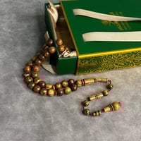 مسباح خشب عود تملكية