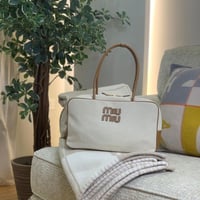 MIU MIU ميو ميو