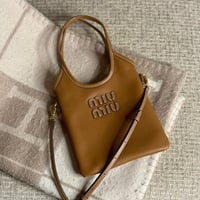 MIU MIU ميو ميو