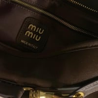 MIU MIU ميو ميو