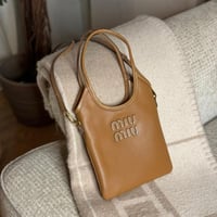 MIU MIU ميو ميو