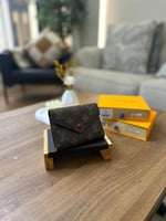 LOUIS VUITTON لويس ڤيتون