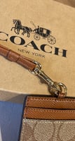 ‏COACH أيدي هولدر كوتش