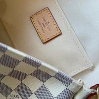 LOUIS VUITTON لويس ڤيتون