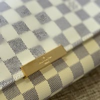 LOUIS VUITTON لويس ڤيتون