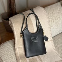 MIU MIU ميو ميو