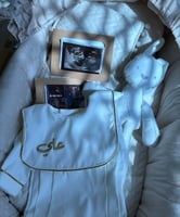 طقم أفرول أبيض مطرز بذهبي