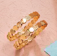 بناجر أطفال مطلية ذهبية