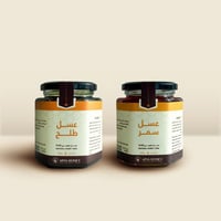 نصفين من عسل الطلح وعسل السمر