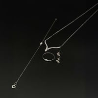 طقم ذهب أبيض مرصع زيركون عيار 18