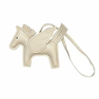 تعليقة الحصان البيج | Dossié