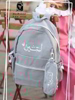 شنطه مدرسية لون رصاصي-كتابة بالاسم