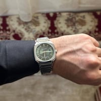 ساعة ماركة ( UNIVERSE POINT) زيتي -فضي