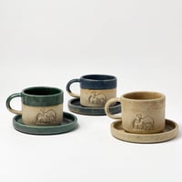 كوب مع صحن عام الابل