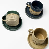 كوب مع صحن عام الابل