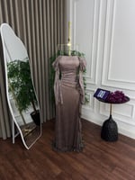 فستان تَرَاتيل الدانتيل