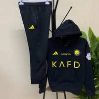 طقم شتوي اسود نادي النصر 2026 تصميم رياضي رسمي بال...