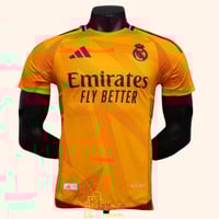 تيشيرت ريال مدريد البرتقالي 2026 - قميص الملكي الج...