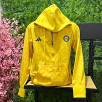 جاكيت شتوي نادي النصر الأصفر الذهبي 2026 تصميم رسم...