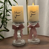 شمعة مع شمعدان