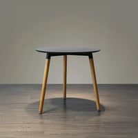 طاولة خشب دائرية بأرجل وجوانب مستديرة من الخشب الص...