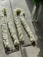 عقد من الورد ترخرج بالاسم