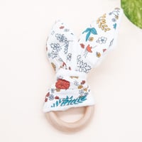 عضاضة خشبية زهور