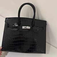 كروك وسط اسود قفل فضي