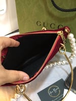 حقيبه يد قوتشي عنابي