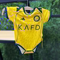 افرول مواليد بشعار نادي النصر الجديد