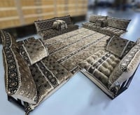 طقم جلسات خارجية لون بني مزخرف