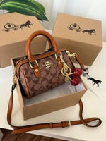 Beige camel-colored coach
