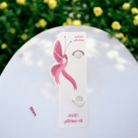 قلم ورق بشعار سرطان الثدي