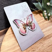 أخراص شكل فراشة بثيم