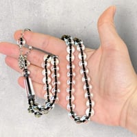 سبحة بكلايت شفاف طربزونة حديد