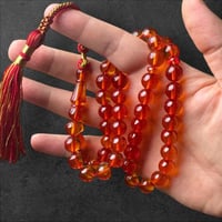 سبحة زعفران برائحة 11 ملم برتقالي شفاف