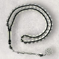 سبحة بكلايت شفاف طربزونة حديد