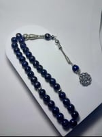 مسباح باللون ازرق - اسود - مع طربزونة