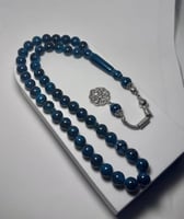 مسباح باللون الاخضر — مع طربزونة