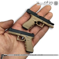 ميداليه مسدس جلوك حديد