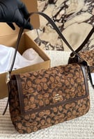 حقيبة coach بحجمين