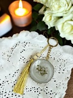 ميدالية متعرجه بالاسم