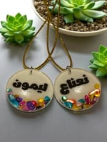 تعليقة ترامس الاحجار الملونه اشكال متعدده (السعر ل...