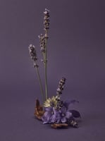 زيت عطري برائحة الباتشولي و العود