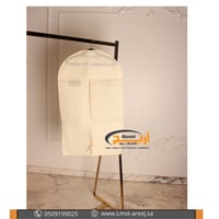 اكياس تغطيه ملابس صغير بيج