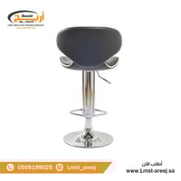 كرسي متحرك جلد لون اسود