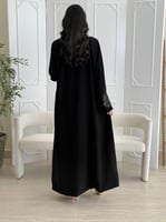 كولكشن العيد | عباية ليزا بقماش كريب رموش مزين بور...