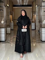 عباية وئام تفته شك فضي