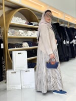 عباية دانيا بقماش شامواه تدخيلات شامواه مموج بيج